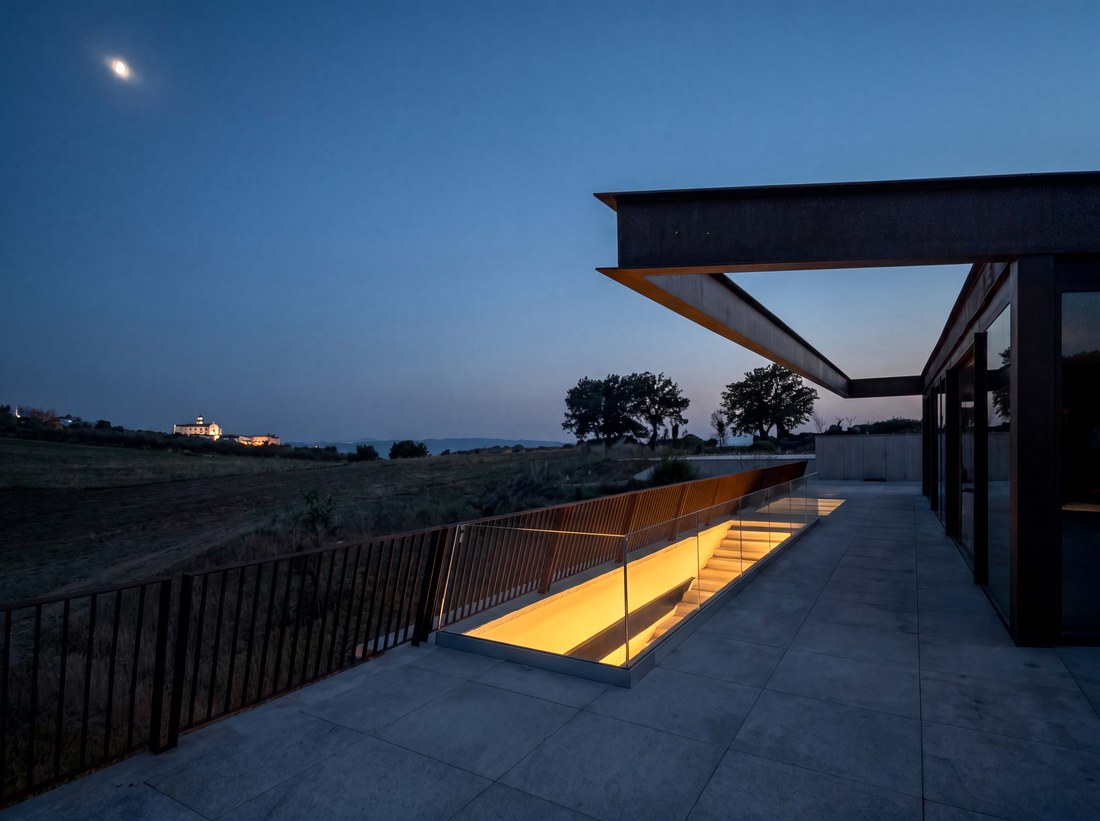 Agriturismo Alma at dusk, the light of the hypogeal hall glowing