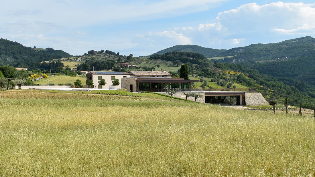 The estate on its ridge facing Assisi